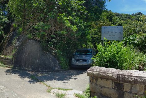 Go past the silver sign